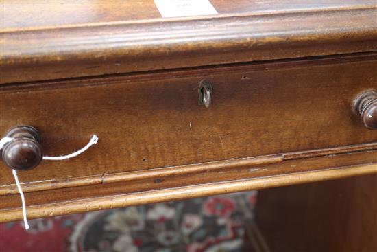 A Victorian mahogany pedestal desk fitted nine short drawers, W.122cm